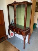 A reproduction mahogany glazed display cabinet with glass shelves