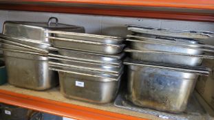 A large selection of stainless steel cooking / catering food containers