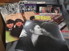 A collection of five assorted The Beatles albums A/F together with a John Lennon Yoko Ono