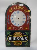 A enamel Hudson's soap shop closing time sign