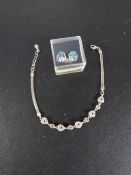 A vintage hallmarked silver bracelet and earrings