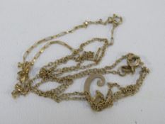 A hallmarked 9 carat gold necklace approx weight 1.4g together with an unmarked fine bracelet