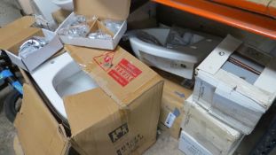 A large selection of sinks, pedestals, tiles, taps, a toilet boxed and unused but unchecked