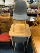 A modern small kitchen table and two chairs