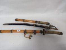 Three assorted display swords