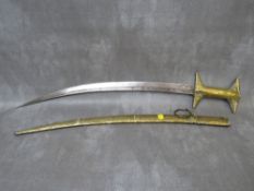 A 19TH CENTURY NORTH AFRICAN TRIBAL ART MOROCCAN S'BULA SWORD, with brass covered sheath