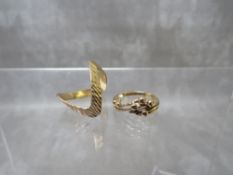 A HALLMARKED 9CT GOLD WISHBONE RING, with bark effect to one side of the wishbone, together with