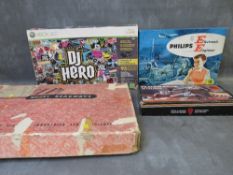 A BOXED XBOX 360 DJ HERO, a vintage boxed Phillips electronic engineer set. boxed Peacemaker 45