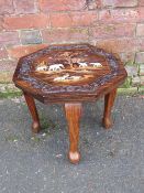 AN EASTERN OCTAGONAL INLAID 'ELEPHANT' TABLE, raised on chunky cabriole legs