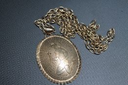 A HALLMARKED 9 CARAT GOLD OVAL PENDANT, on a chain stamped 9ct, approx combined weight 28.9g