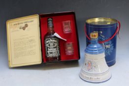 A JACK DANIELS TINNED GIFT SET, together with a Bell's commemorative whisky decanter in gift tin (
