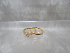 A HALLMARKED 22CT WEDDING BAND, approximate weight 1.7 g, together with a hallmarked 18ct gold