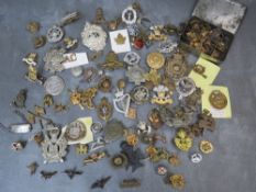 A LARGE QUANTITY OF VARIOUS MILITARY BADGES