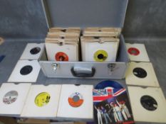 A SILVER HARDCASE SINGLES RECORD CARRY CASE AND CONTENTS, the contents comprising approximately