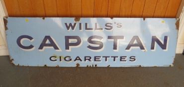 A VINTAGE ENAMELLED METAL SIGN FOR 'WILL'S CAPSTAN CIGARETTES', 46 x 152 cm