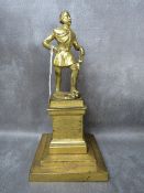 A 19TH CENTURY GILT METAL STUDY OF A MILITARY OFFICER, raised on a plinth, overall H 29 cm