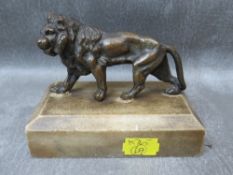 A 19TH CENTURY STUDY OF A BRONZE LION, raised on a stone base, overall H 9.5 cm