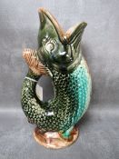 A 19TH CENTURY MAJOLICA FISH PITCHER, H 26 cm