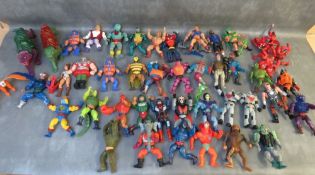 A JOB LOT OF VINTAGE FIGURES, to include He-Man etc.