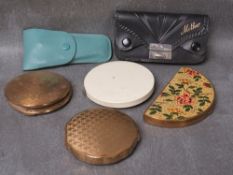 A SELECTION OF VINTAGE POWDER COMPACTS AND VANITY SETS (6)
