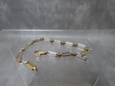 A 9CT WHITE AND YELLOW GOLD FANCY LINK BRACELET, approximate L 19 cm, marked 375 to clasp,