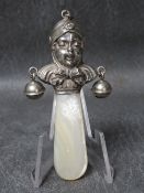 A HJALLMARKED SILVER BABY'S RATTLE, with mother of pearl handle, L 12 cm