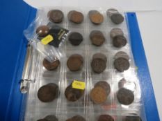 AN ALBUM OF BRITISH AND WORLD COINS, to include issues from Canada, Italy, USA, Ireland etc., with