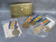A WORLD WAR I CHRISTMAS 1914 TIN, together with five victory medals, various soldiers