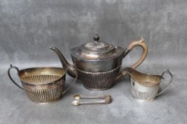 A HALLMARKED SILVER THREE PIECE TEA SERVICE BY MAPPIN & WEBB - SHEFFIELD 1896, together with a