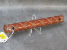 A VINTAGE TIBETAN ARTEFACT, possibly a musical instrument, L 19.5 cm
