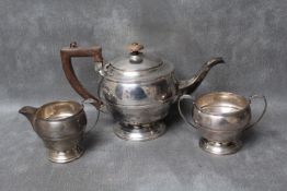 A HALLMARKED SILVER THREE PIECE TEA SERVICE - BIRMINGHAM 1937, makers mark TS, approx weight 640g