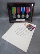 A CASED SET OF FOUR MEDALS, together with a set of miniature medals and three certificates to '