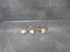 A HALLMARKED 9CT GOLD OPAL SET DRESS RING, size P ½, approximate weight 2.2g, together with a pair