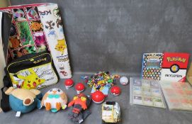 MIXED POKEMON LOT, to include albums and a tin of cards, two books, three Tomy soft toys, Pokémon
