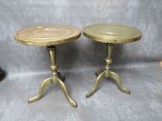 A PAIR OF EARLY 20TH CENTURY BRASS TRIVITS, raised on tripod supports, H 32 cm, (2)