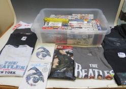 A MIXED BEATLES LOT, to include eight t-shirts in sizes Medium & Large, twenty video tapes and two