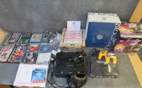A MIXED ELECTRONIC TOY LOT, to include boxed Sega Dreamcast, leads, games and instructions,