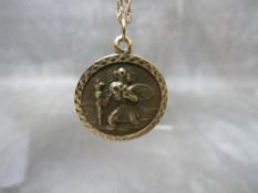 A HALLMARKED 9CT GOLD ST CHRISTOPHER PENDANT, approximately 6.5 g, suspended on an unmarked yellow