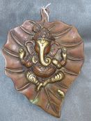 AN INDIAN BRASS PLAQUE DEPICTING GANESH, H 21 cm, W 16 cm