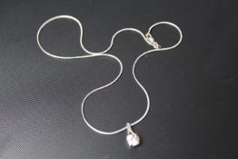 A DIAMOND SOLITAIRE PENDANT, having a brilliant cut diamond of an estimated 1 carat, set in 18 carat