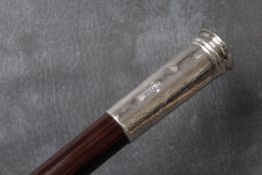 A CHANNEL ISLANDS GUERNSEY SILVER TOPPED WALKING CANE, with Guernsey silver marks for 2005, engraved