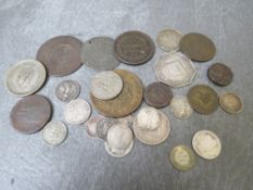 A collection of British and world coins and tokens to include Greece 1845 10 lepta, India 1944