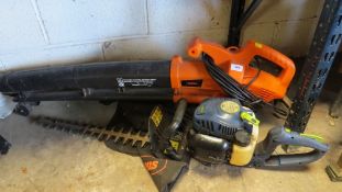 An Xtreme 2 stroke hedge cutter and a Vonhaus garden Vacuum