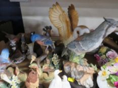 Two trays of assorted ceramics to include animal figures, plates etc