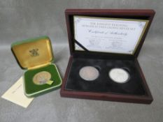 The longest reigning monarch two silver coin set ( 1890 and 1977 coins) in case with COA and