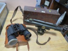A white of Glasgow cased spirit level telescope together with a pair of binoculars