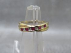 A hallmarked 9ct gold two colour gemset ring, ring size P ½, approximate weight 2.88g