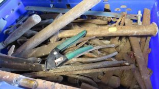 A plastic tray containing various hand tools