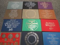 A selection of United Kingdom decimal coinage to include various proof sets, tins containing