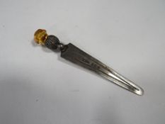 An Edwardian silver thistle topped bookmark set with cairngorm stone hallmark Birmingham 1909
